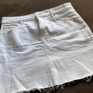 White Denim mini skirt w/raw hem